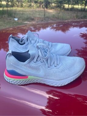 Nike Women's Epic React Flyknit Running Shoes with Neon Heel Accents